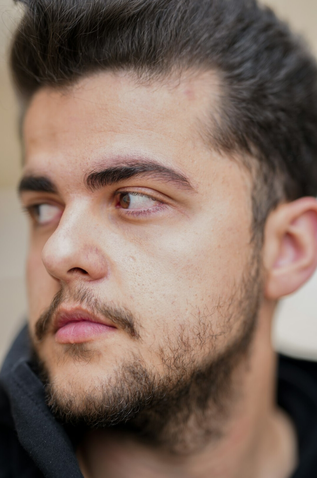 Portrait of a young man with a beard