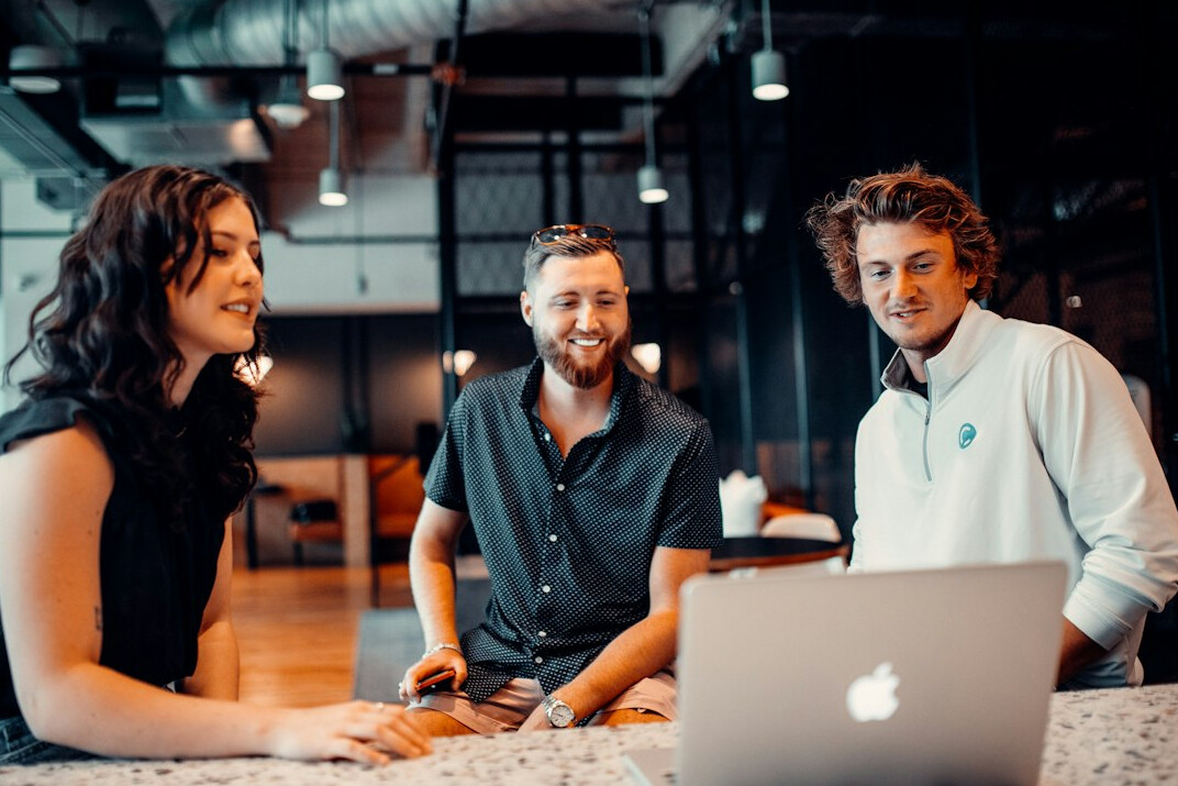 group of coders collaborating