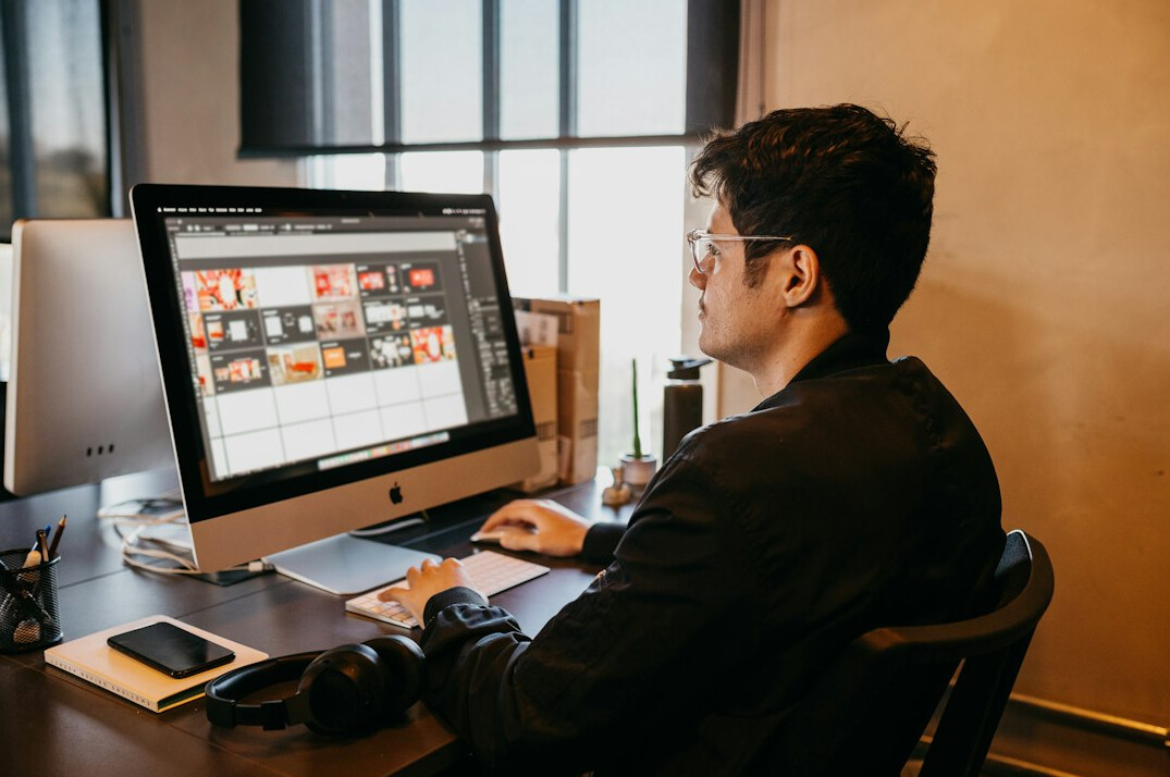 japanese programmer at desk