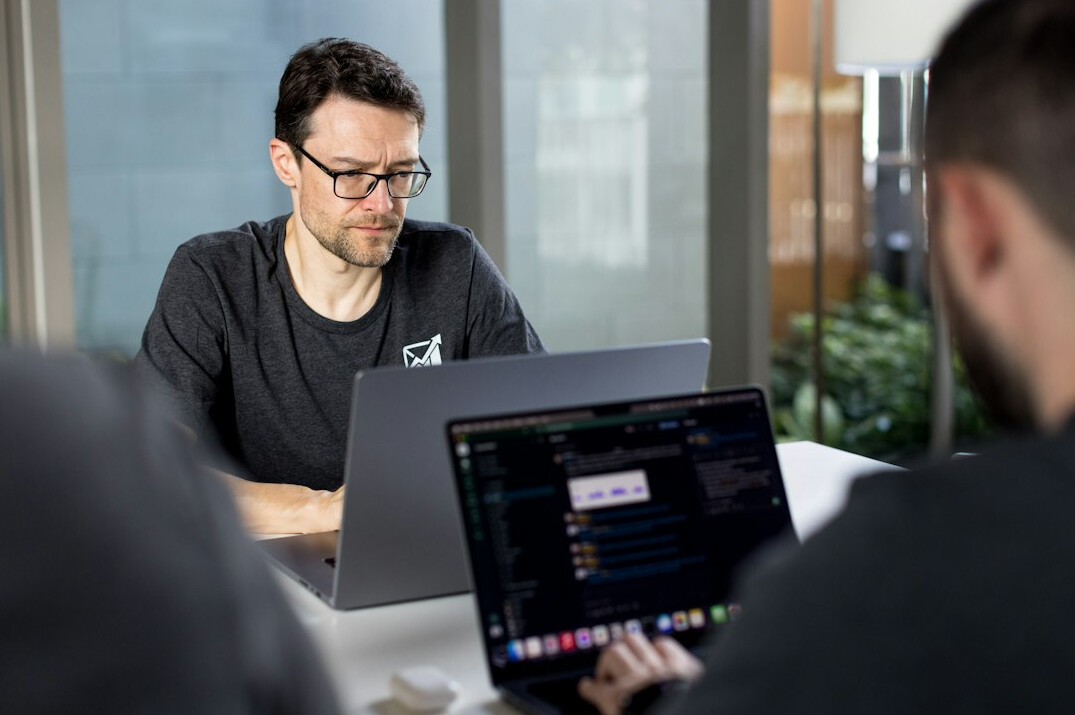 group of programmers discussing