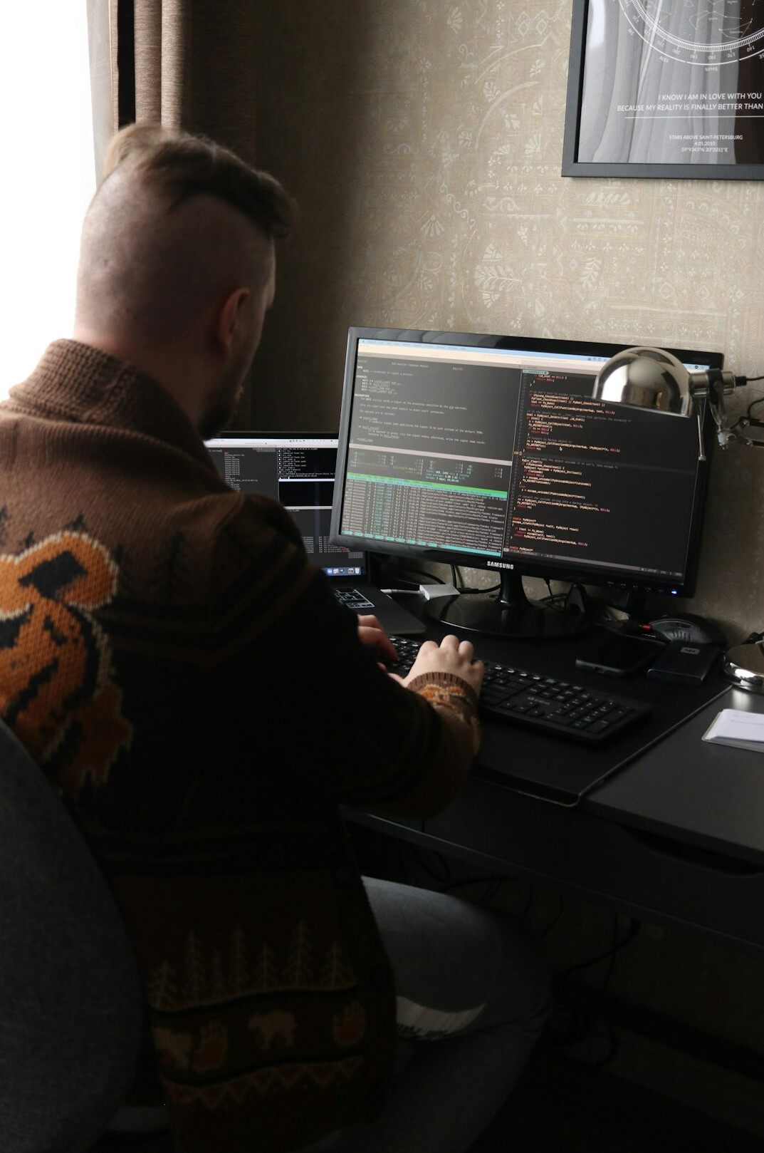 person reviewing code on screen